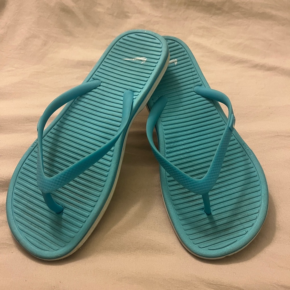 Women's Nike Blue Flip Flops